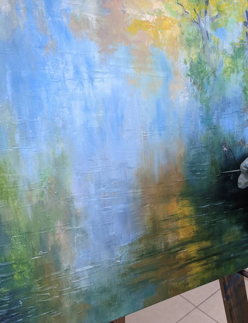 An impressionist painting of trees reflected in water