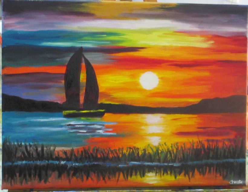 A vivid sunset sailboat painting