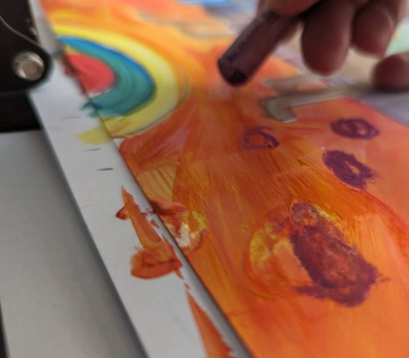 A student's sunshine painting, as a postage stamp