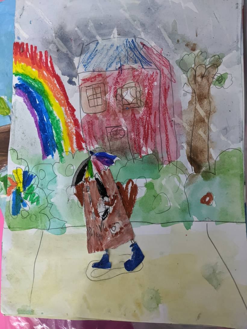 A bright rainbow house painting