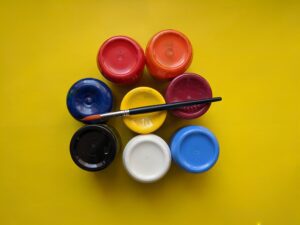 Value scale showing light and dark paint colors for understanding value in painting