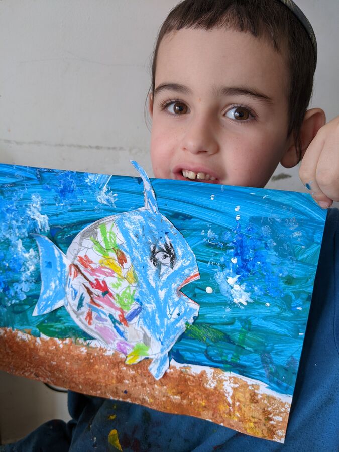 Student with their painting